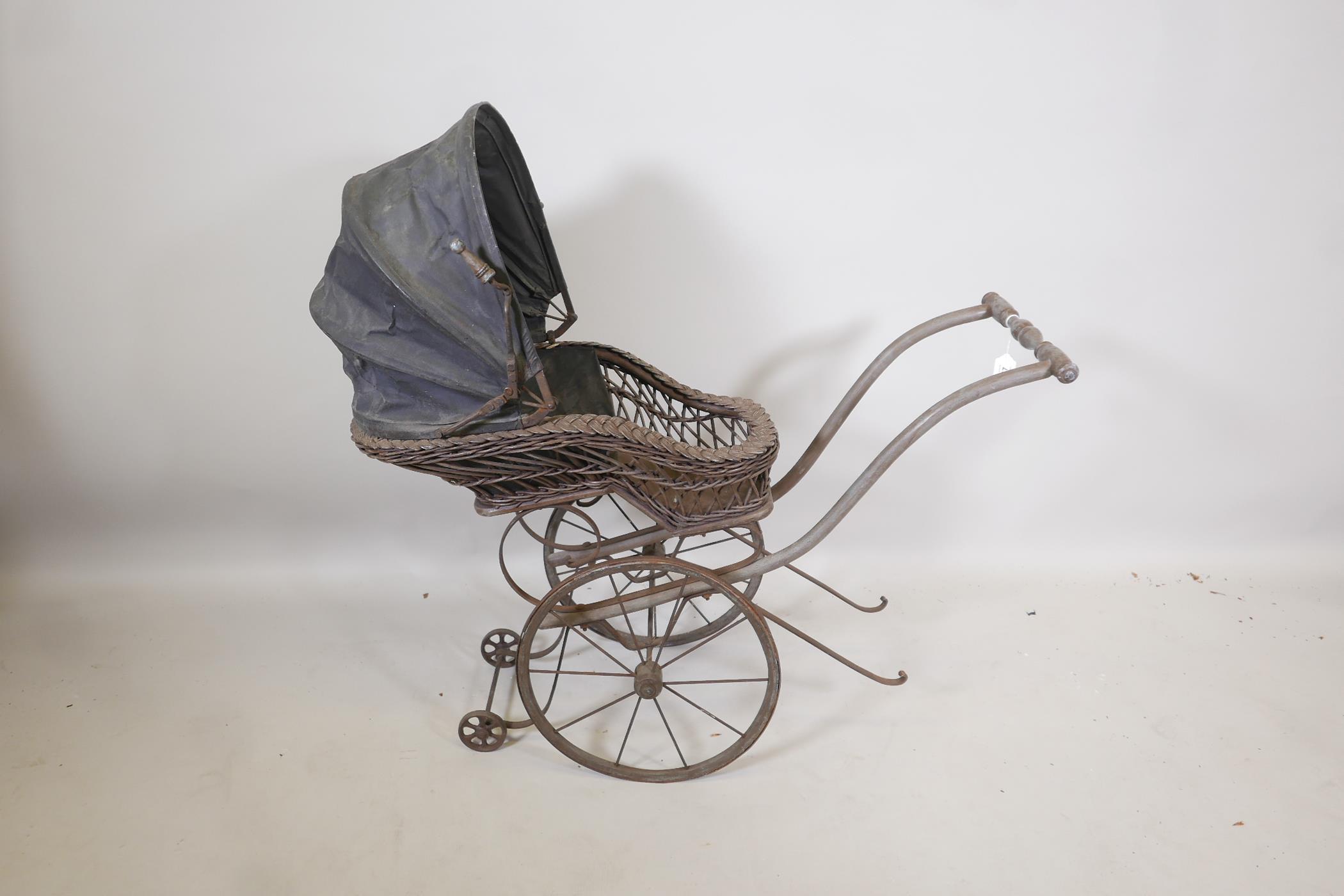 A Victorian wood framed and cane child's pram, 38" x 15" x 35" high - Image 2 of 2