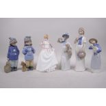 A Royal Doulton 'Gift of Love' figurine, together with two Nao figures of children, and three Rex