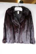 A lady's mink fur jacket from Charles Moss Furs, approximate size 14, 22" long