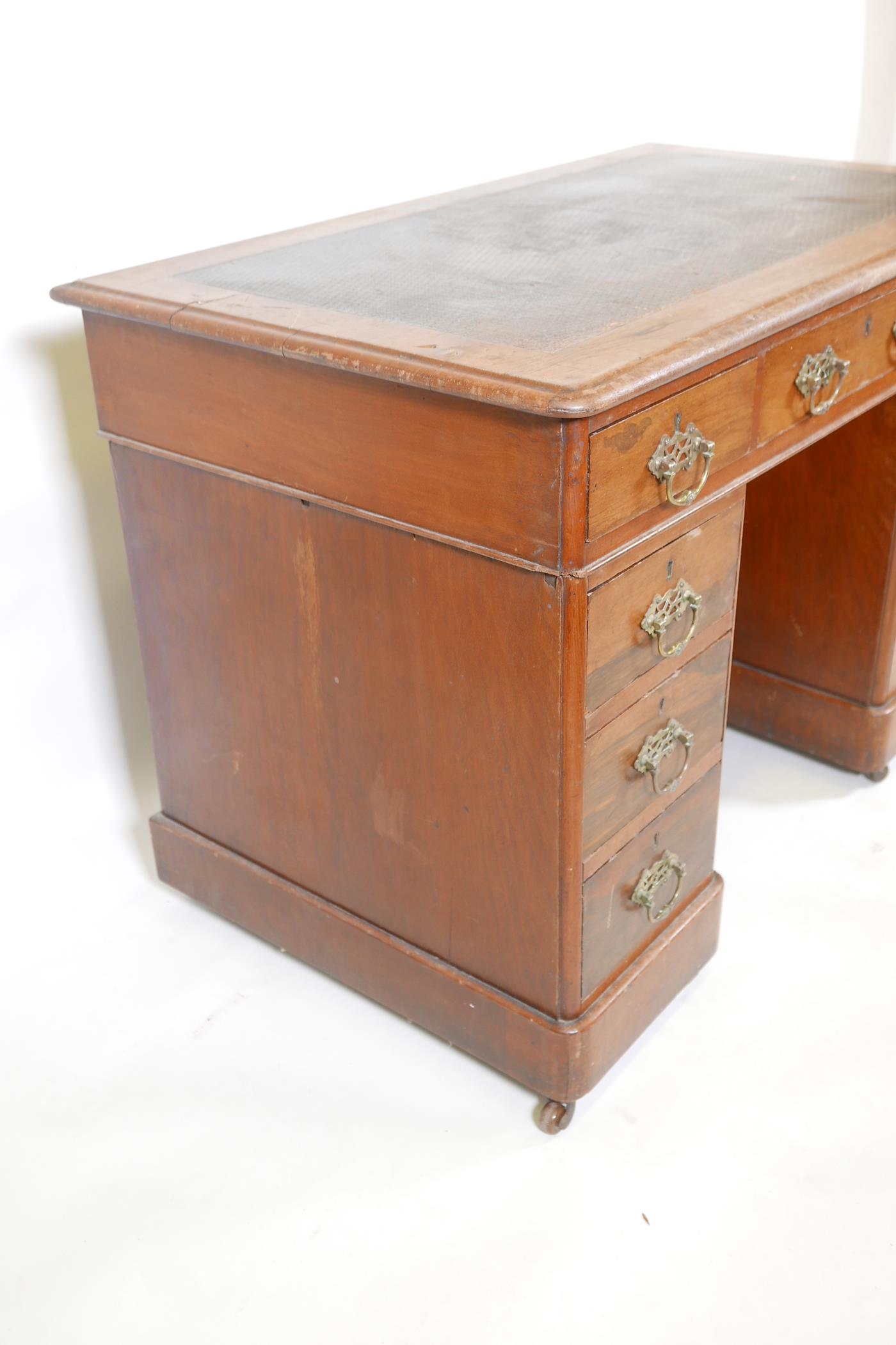 A Victorian walnut pedestal desk with an inset faux leather top and nine drawers, 40" x 23", 27" - Image 5 of 6