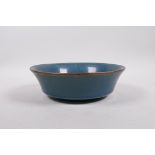 A Song style teal glazed pottery dish with chased and gilt character inscription to the bowl and