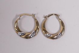 A pair of bonded gold 925 silver hoop earrings