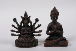 A Sino-Tibetan coppered figure of a many armed deity seated on a lotus throne, and another of