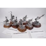 A collection of seven limited edition Chilmark Gallery American tribal figures; Blackfoot, Shoshone,