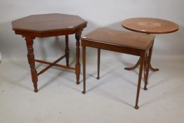 An Edwardian walnut centre table with an octagonal top, turned supports and cross stretcher, and a