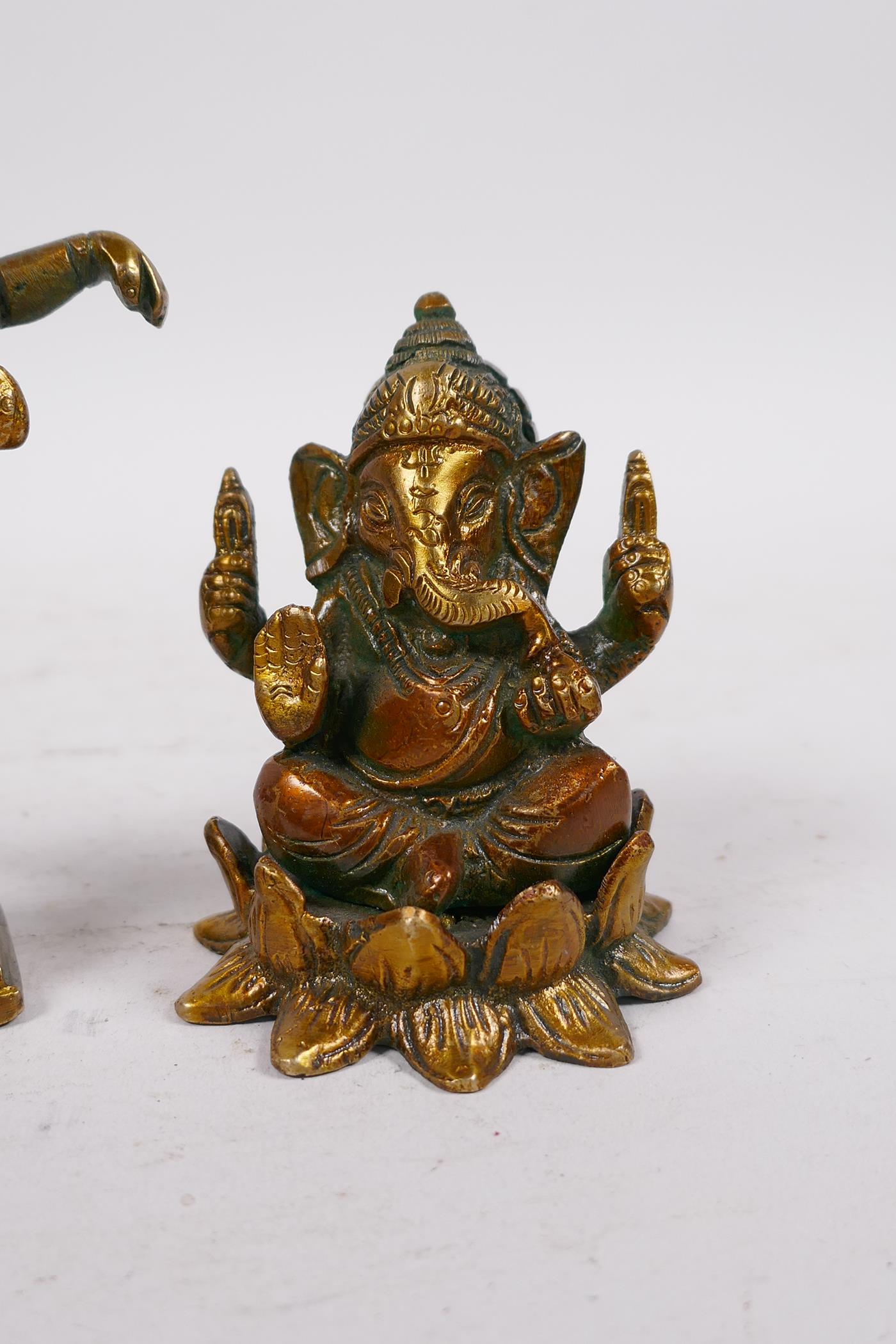 An Indian bronze of Ganesh seated on a lotus throne, and another Ganesh seated on a plinth, - Image 3 of 3