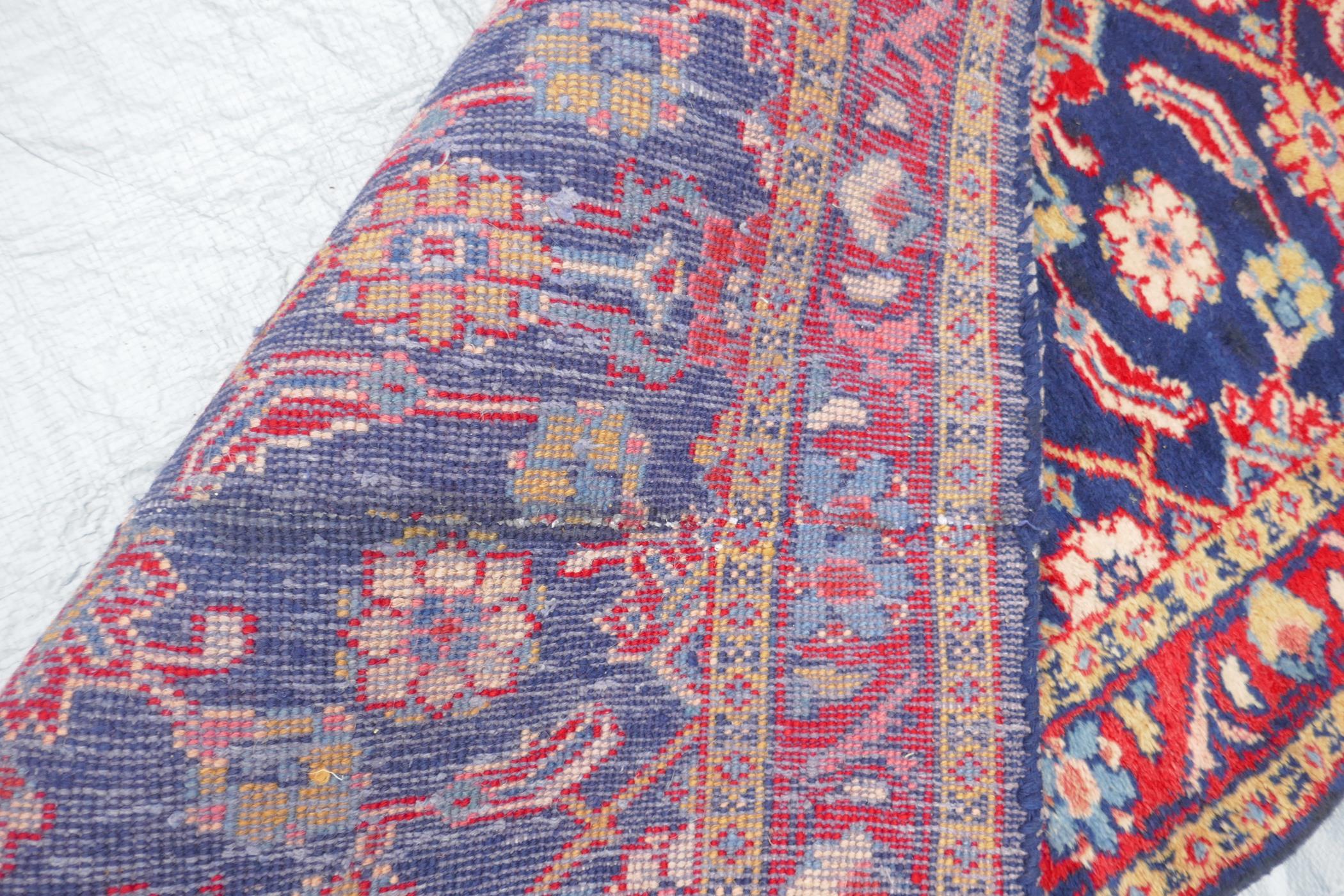 A blue ground Persian Sarouk runner with all over design and red borders, 33" x 140" - Image 8 of 8