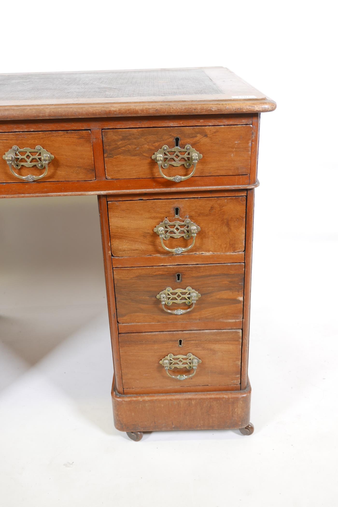 A Victorian walnut pedestal desk with an inset faux leather top and nine drawers, 40" x 23", 27" - Image 3 of 6
