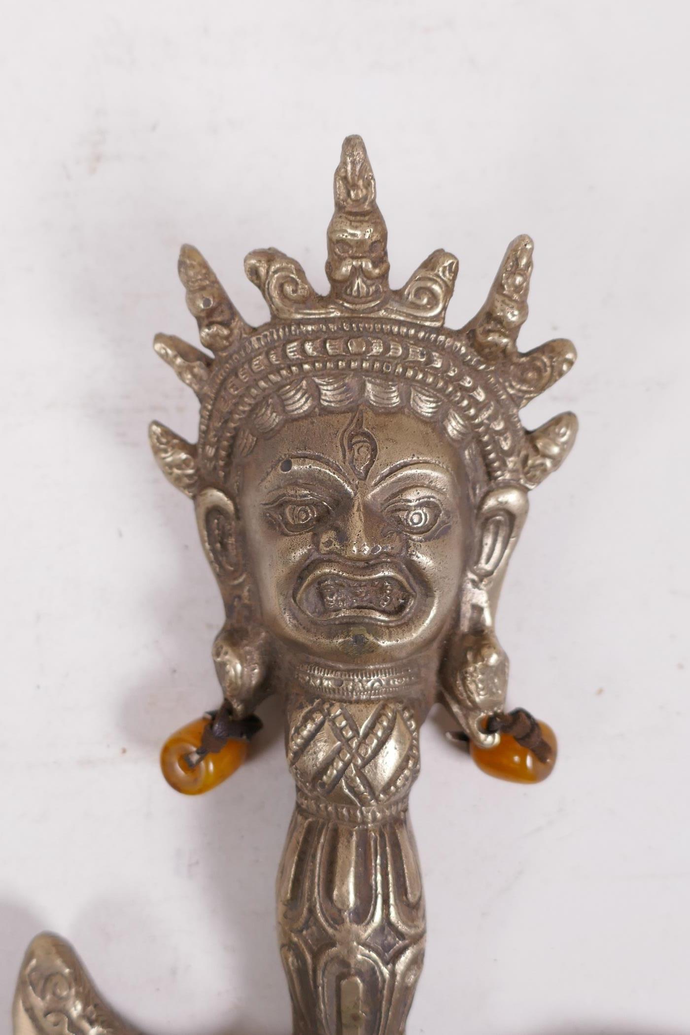 A Sino-Tibetan bronzed metal kartika, the handle decorated with a wrathful deity - Image 2 of 3