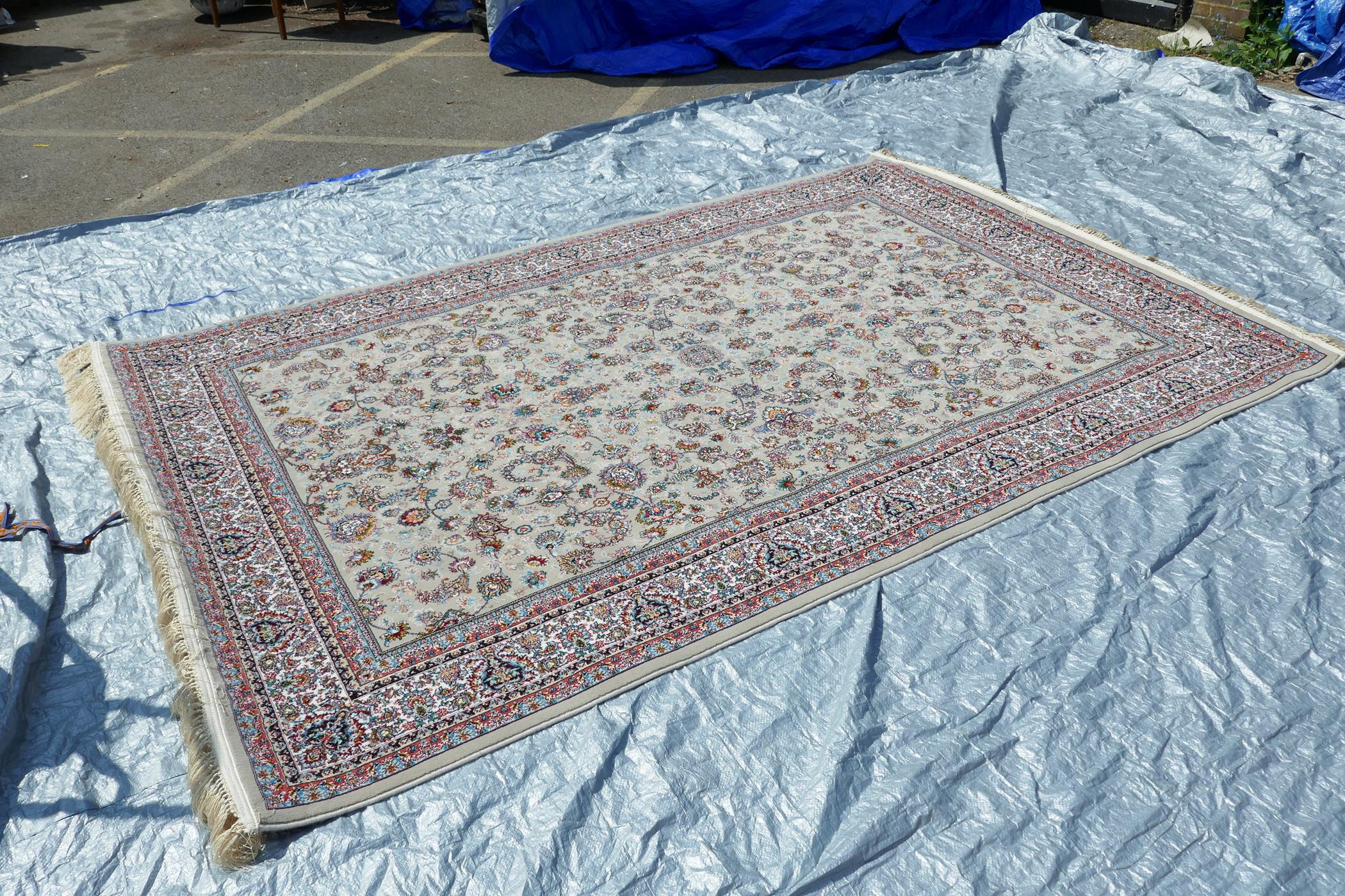 A fine woven beige ground full pile Iranian carpet with an all over floral pattern, 118" x 78" - Image 3 of 5