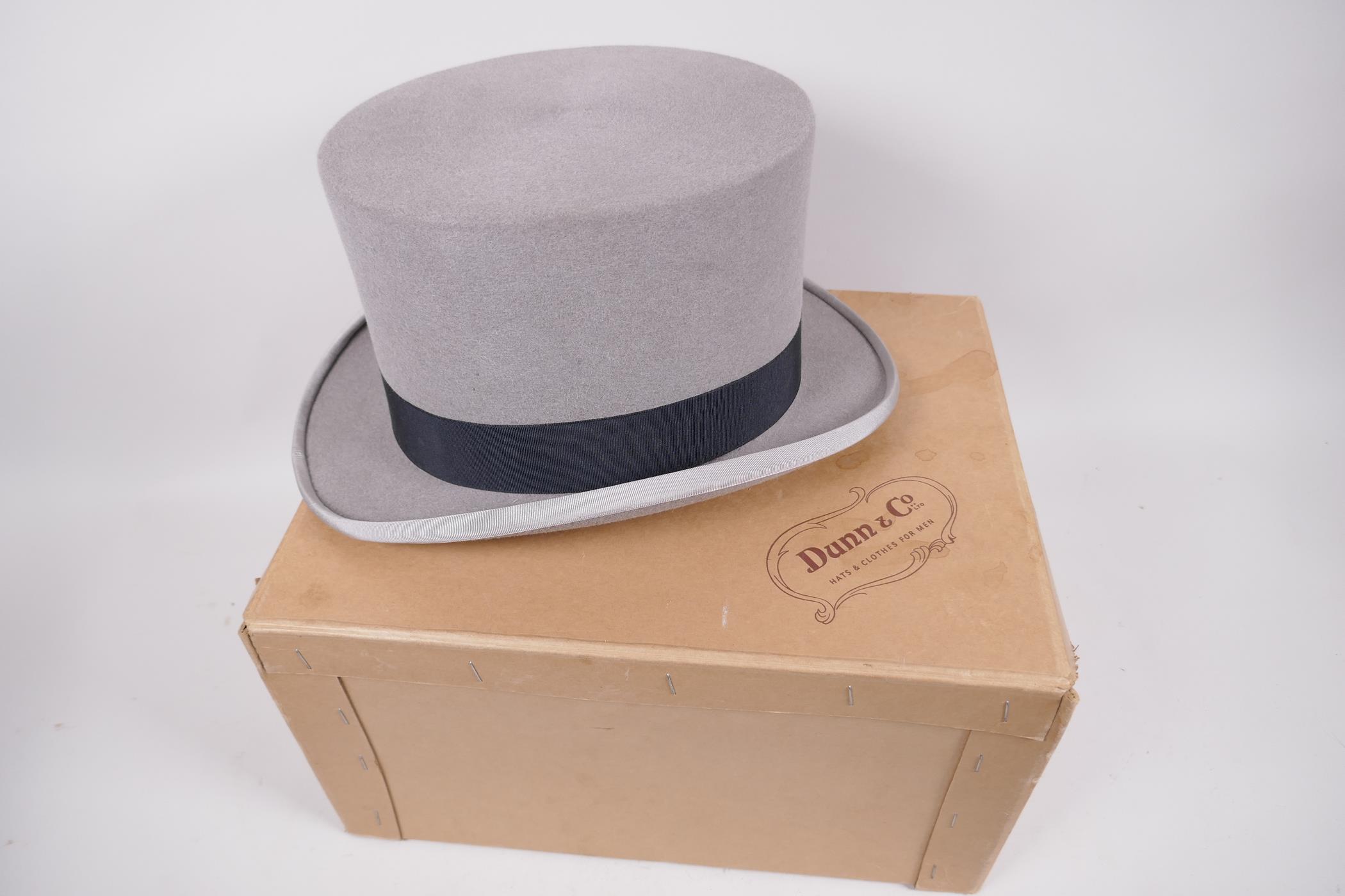 A Dunn & Co. grey top hat, size 7?, in original box