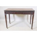 An early C19th Irish mahogany Chippendale style tea table of large proportions, the top with