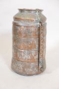 A set of five antique Middle Eastern silvered copper stacking containers, with engraved