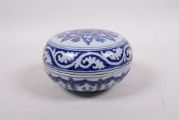 A Chinese blue and white porcelain box and cover with Yin Yang decoration, 6 character mark to base,