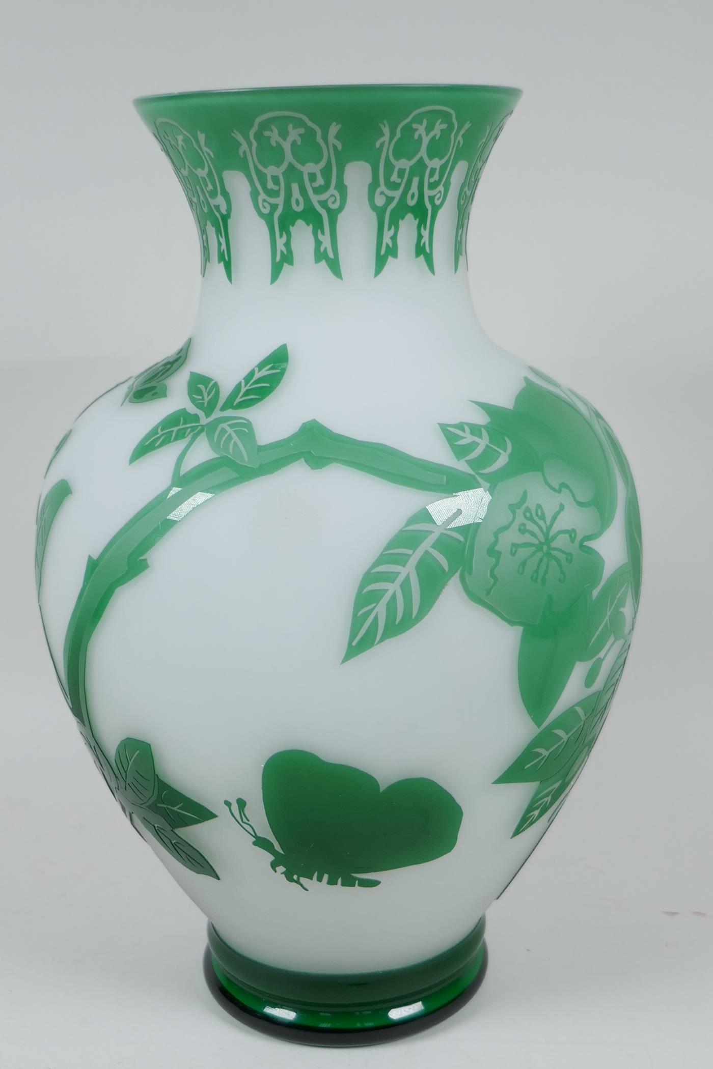 A Peking glass vase with cut green overlay over white, depicting butterflies and flowering branches, - Image 2 of 4