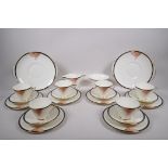 A six setting Royal Doulton 'Tango' pattern tea service to include cups, saucers, cake plates,