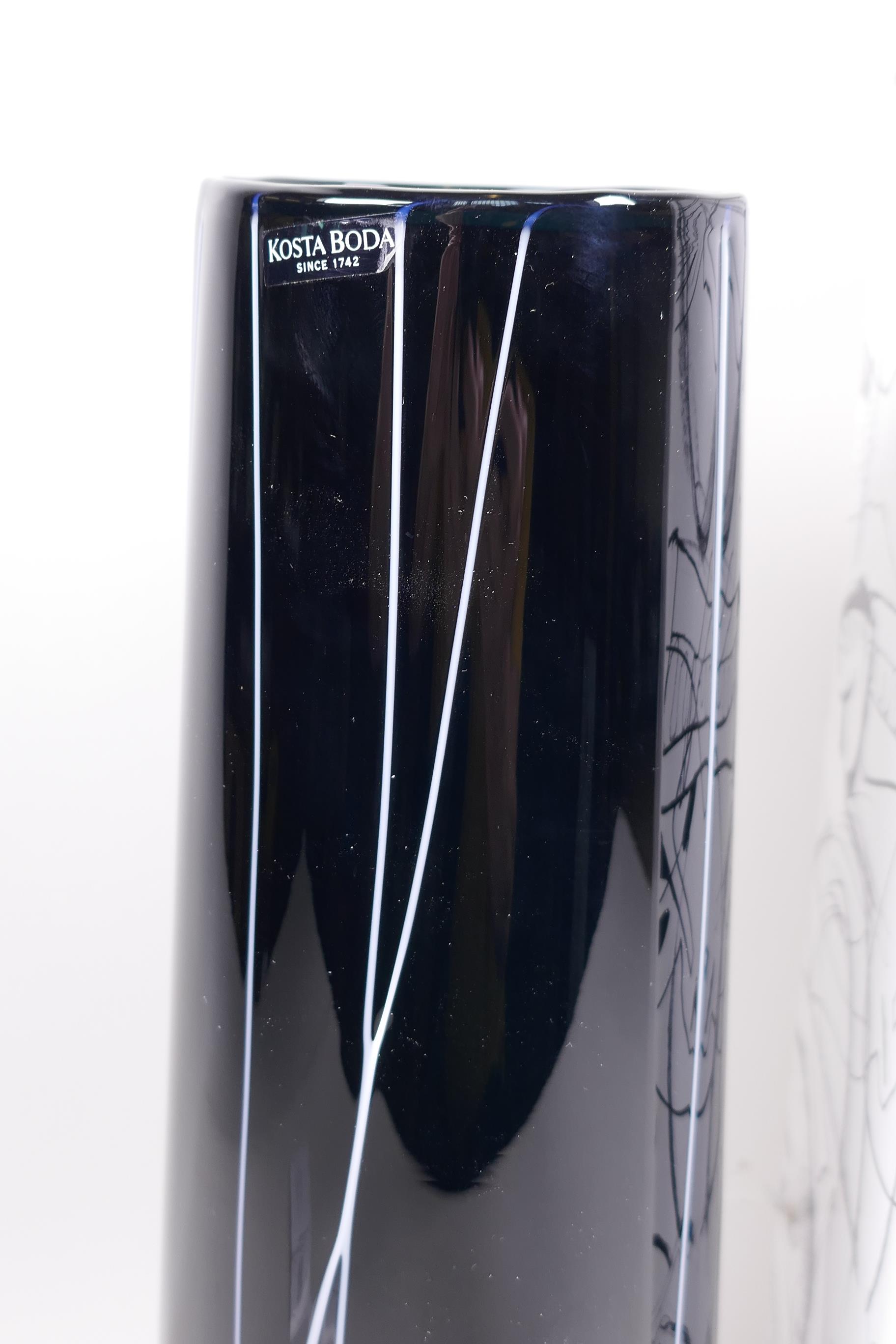 A tall Swedish Kosta Boda tapered cylindrical vase with white cut decoration on a black body, 13" - Image 3 of 3