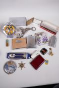 Miscellaneous items including a chrome and enamel AA badge, flasks, harmonica etc