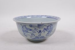 A blue and white porcelain rice bowl, decorated with boys playing in a landscape, 5½" diameter