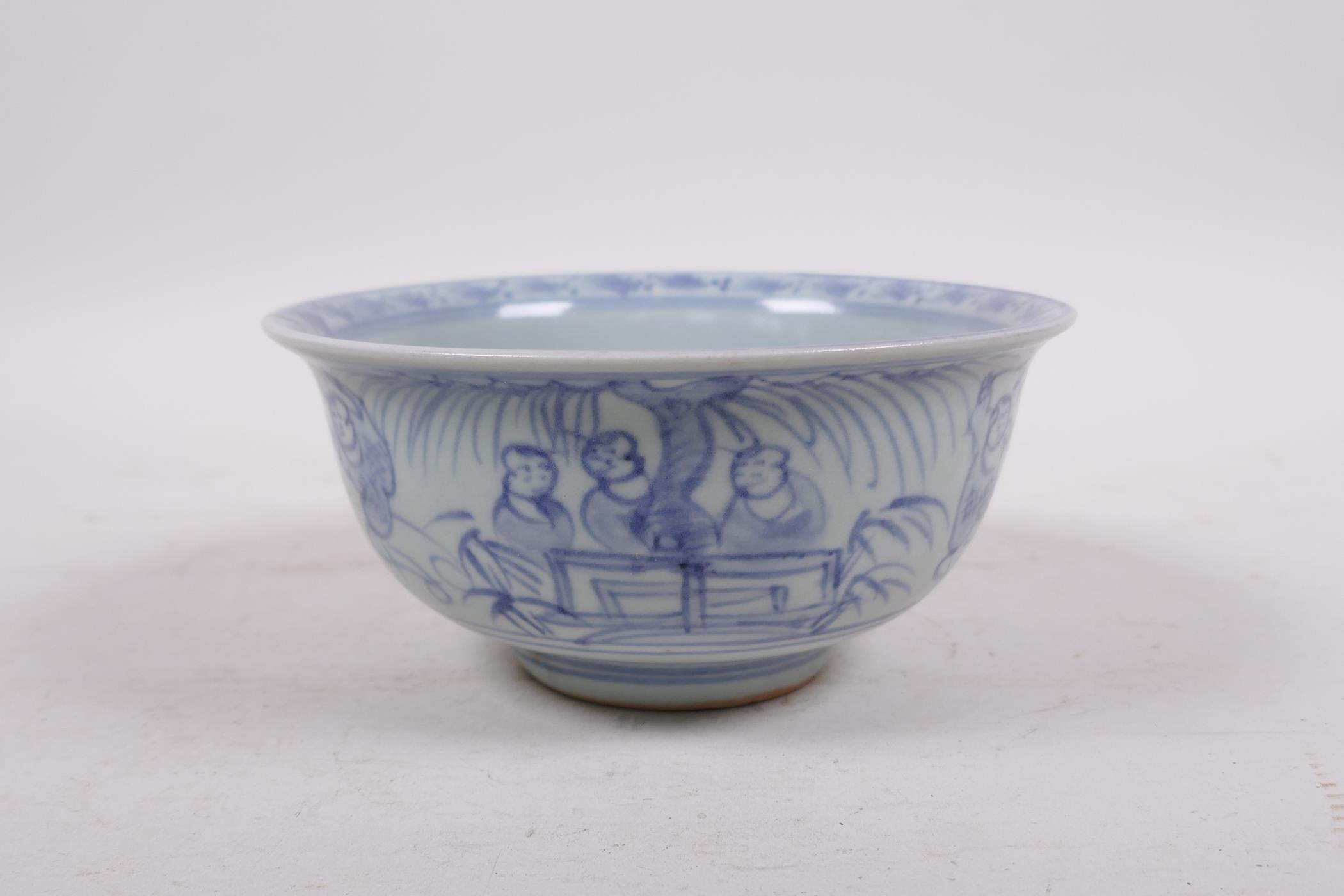 A blue and white porcelain rice bowl, decorated with boys playing in a landscape, 5½" diameter - Image 2 of 5