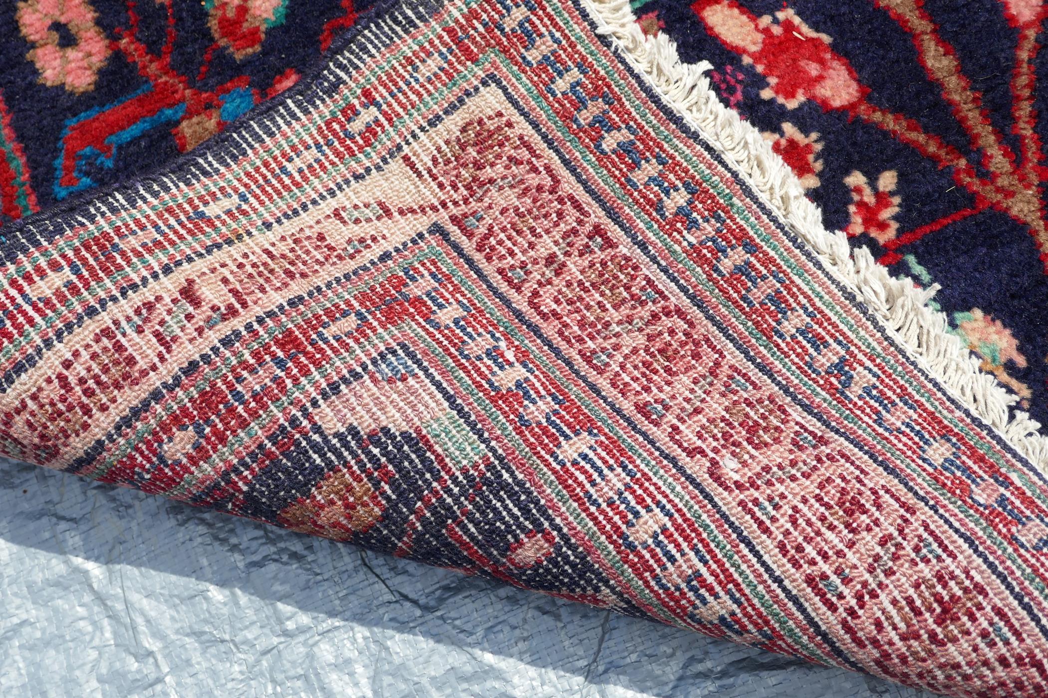 A rich blue ground full pile Persian Sarouk runner with an unique floral pattern, 122" x 41" - Image 8 of 8