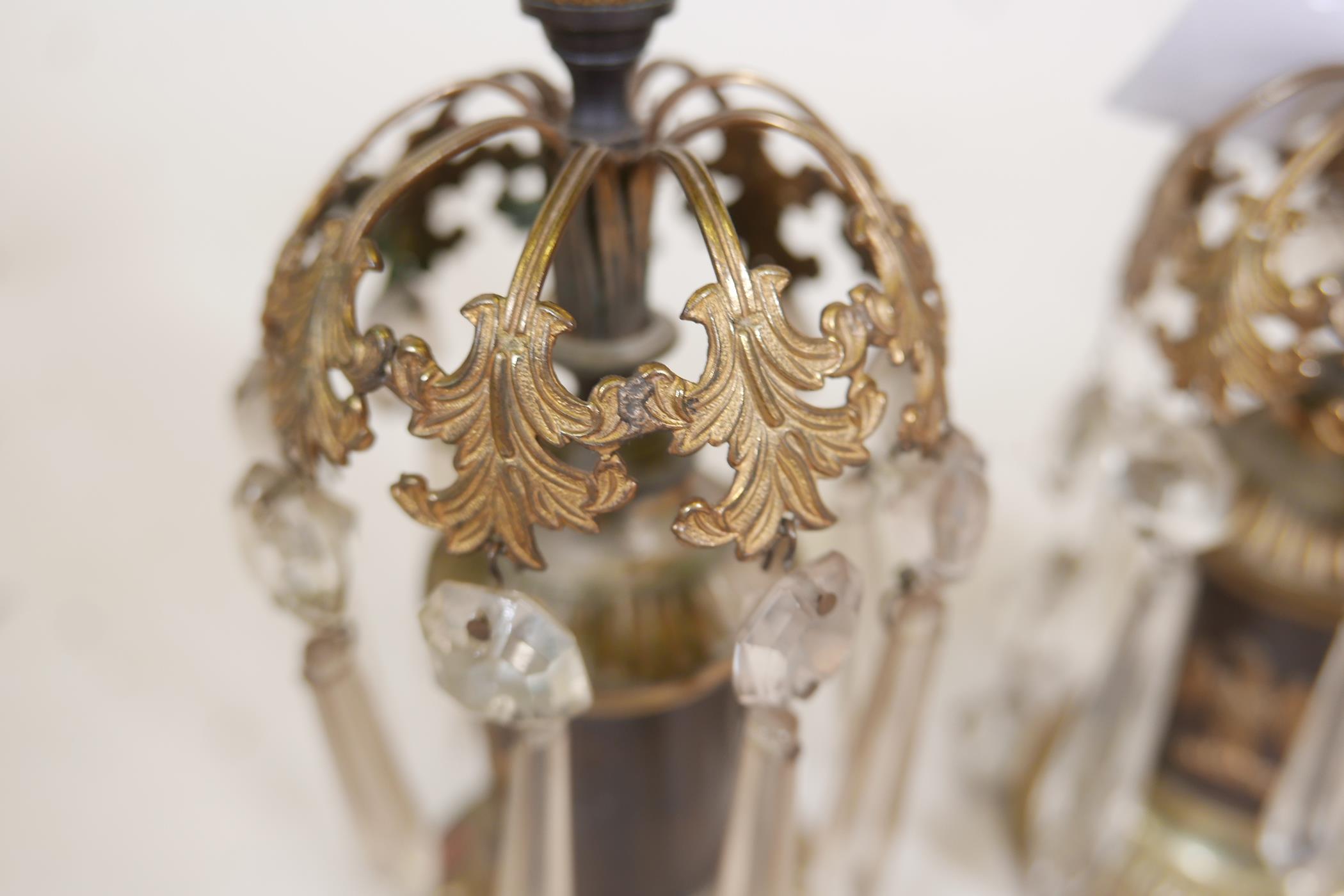 A pair of C19th bronze and ormolu mounted candlesticks with glass lustre drops and applied - Image 4 of 4