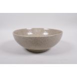 A Song style celadon crackleware bowl, Chinese, 8" diameter