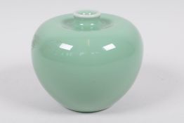 A Chinese porcelain green glazed, apple shaped vase with slender neck, 3¼" high