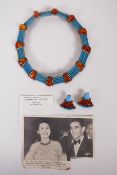 An Egyptian Faience and amber collar necklace set in Egyptian silver with matching clip earrings,