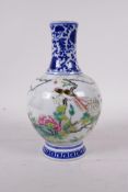 A polychrome porcelain vase decorated with exotic birds and flowers, Qianlong seal mark to base,