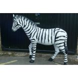 A life size fibreglass figure of a zebra