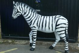A life size fibreglass figure of a zebra