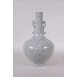 A Chinese Ge ware crackleglazed bottle vase with two handles, 9" high