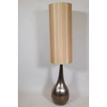 A bottle shaped lustre ware floor lamp, with tubular shade, 50" high overall