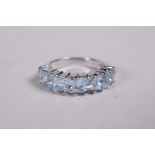 A 925 silver and blue topaz dress ring, approx size N/M