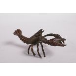 A Japanese Jizai style bronze crayfish, impressed mark to base, 3" long