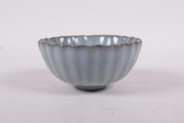 A Ru ware style porcelain rice bowl of ribbed form, 4" diameter