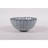 A Ru ware style porcelain rice bowl of ribbed form, 4" diameter