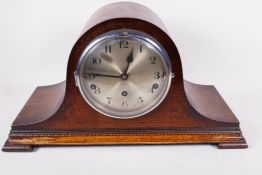 An oak cased Napoleon hat mantel clock, with three train Westminster/Whittington chiming movement,