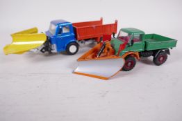 A Dinky Toys Model Ford D800 snow plough, no tailboard, 7" long, together with a Corgi model