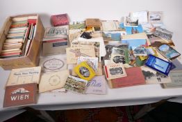 A collection of postcard books and booklets, approx 140