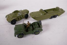 Three Dinky Toys model army vehicles, a DUKW Amphibian, 5" long, a Ferret Scout car and an Austin