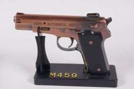 A Kingsway semi automatic M459 pistol table lighter, 5" long, boxed