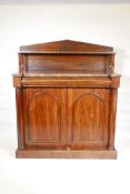 A Victorian rosewood chiffonier, with a single drawer over two doors flanked by columns, 46" x
