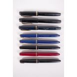 Two Parker Victory fountain pens, a Danish Parker Popular, and five Parker Slimfold pens, all appear