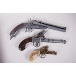 Two replica flint lock pistols and a replica duelling pistol, 13" long