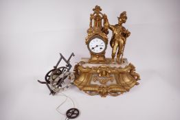 A C19th Continental spelter and onyx mantle clock cast as a huntsman standing beside a clock