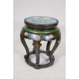 A Chinese lacquered vase stand, with painted and gilded decoration and inset cloisonne enamel top,