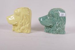 A mid C20th ceramic wall pocket in the form of a spaniel's head, impressed McCoy, 6" high, and