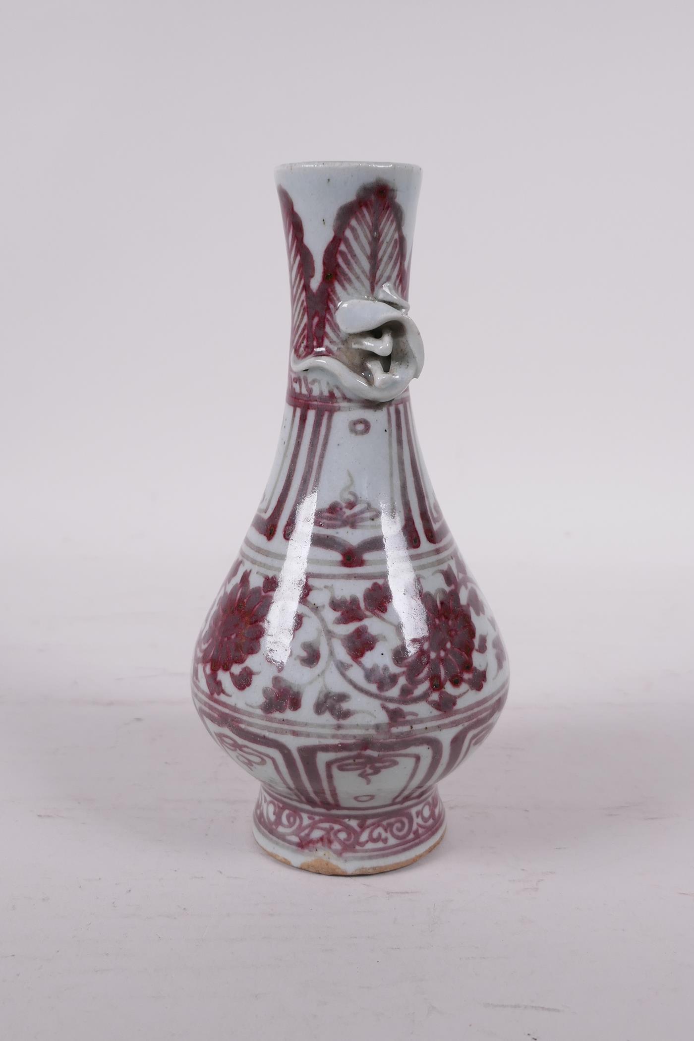 A Ming style red and white pottery vase with climbing kylin decoration to neck, 6" high